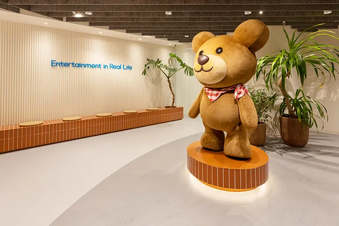 “Entertainment in Real Life” and the company bear