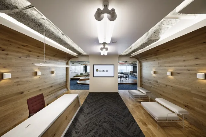 A timber tunnel to the Expedia logo